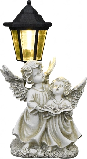 Diseño funerario con dos angelitos