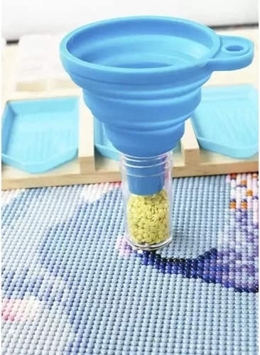 Embudo de silicona plegable para un trasvase limpio