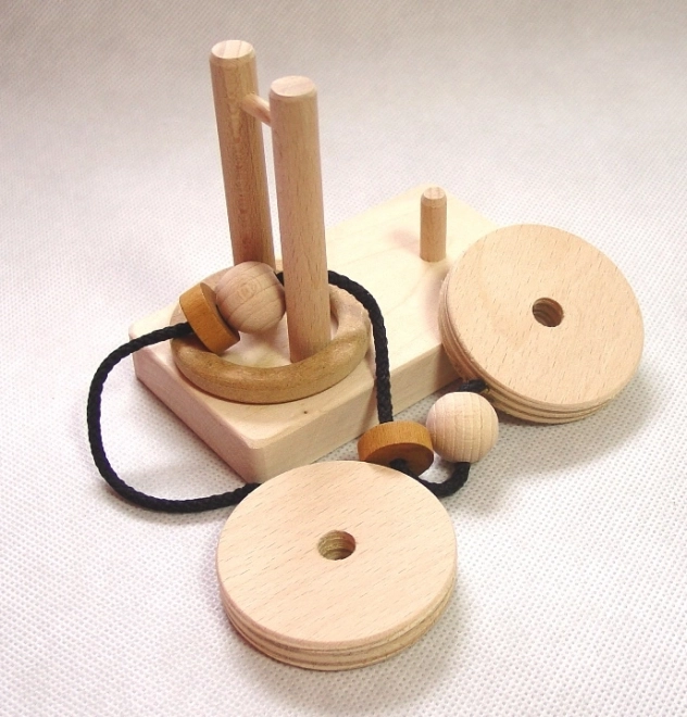 Rompecabezas de madera huso
