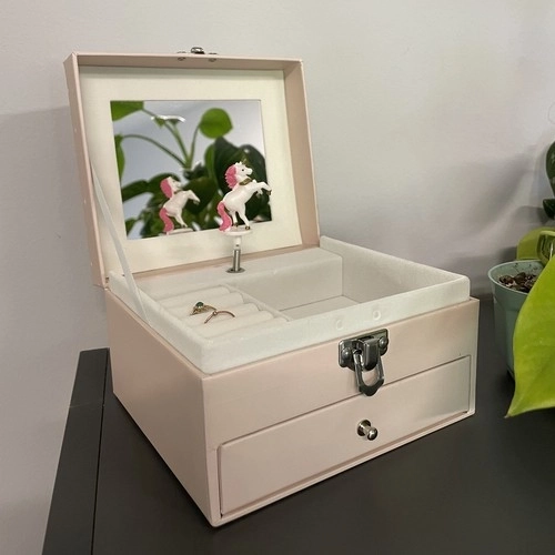 Caja de música con unicornio giratorio
