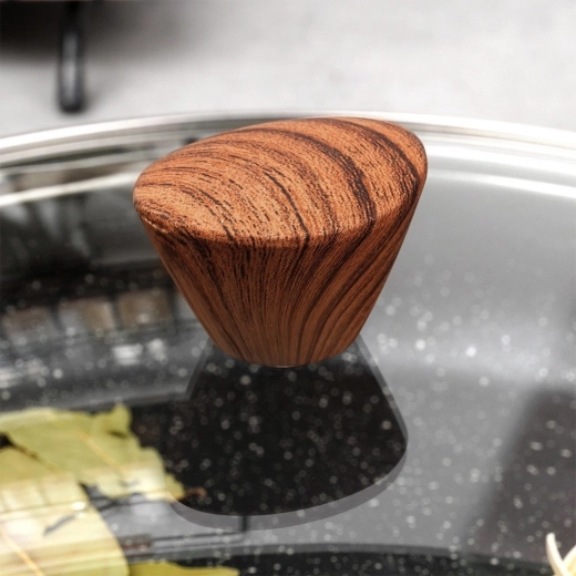 Agarre cómodo con aspecto de madera y ventilación de vapor