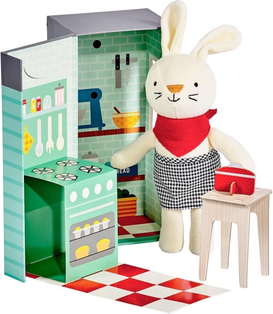 Petit Collage conejo de peluche en la cocina
