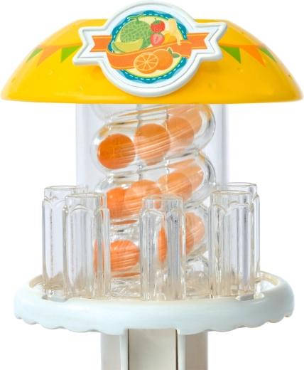 El dispensador en espiral de naranjas se activa