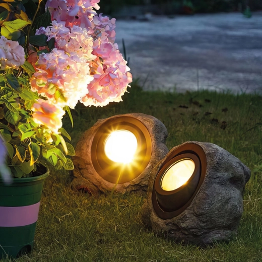 Lámpara LED solar de jardín con forma de piedra