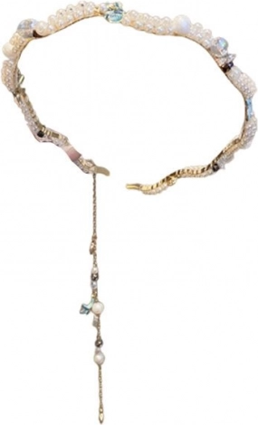 Diadema decorativa con motivo de concha y perlitas