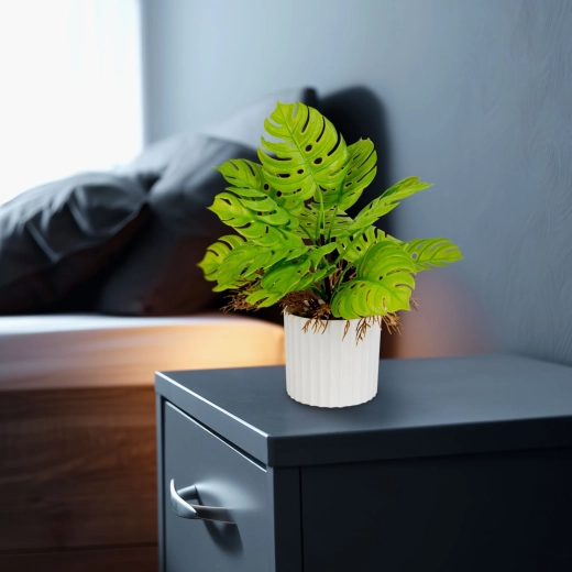 Monstera artificial decorativa en maceta