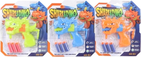 Pistola dinosaurio con dardos de espuma