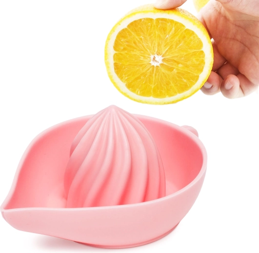 Exprimidor de silicona para limón rosa