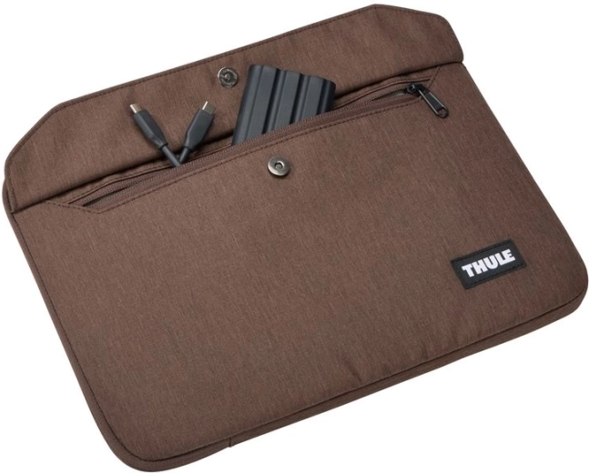 Práctico bolsillo delantero para accesorios