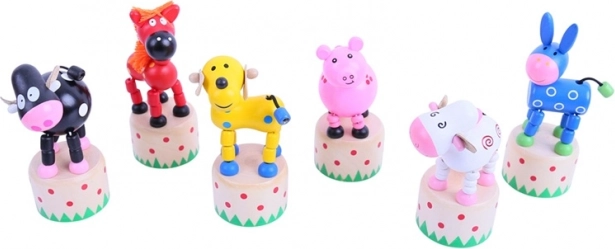 Animalitos de madera para presionar Bigjigs Toys