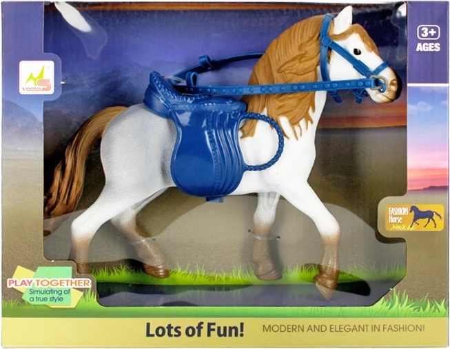 Pony con accesorios – figura de plástico con silla y arnés