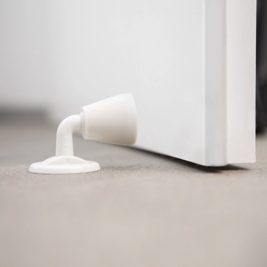 Tope de puerta autoadhesivo con protector de goma blanco