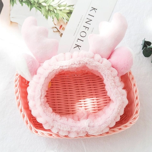 Diadema cosmética de felpa con cuernos – rosa