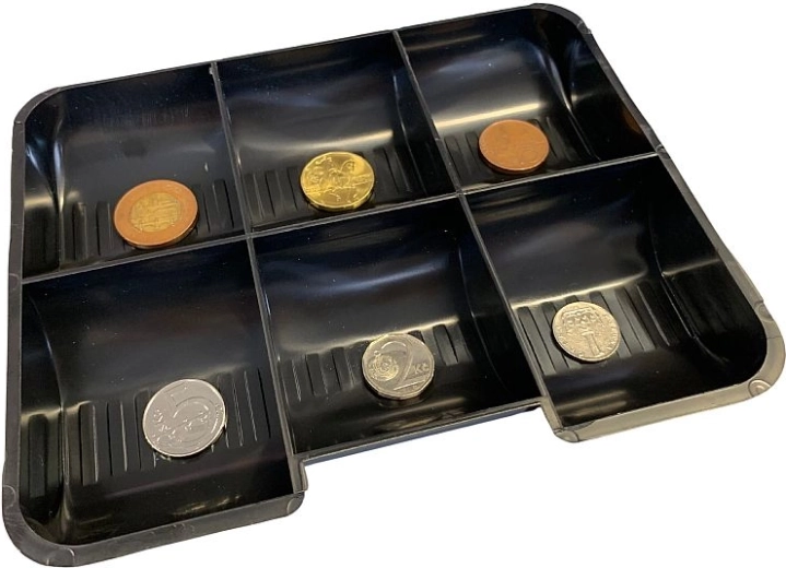 Bandeja para monedas clara y organizada