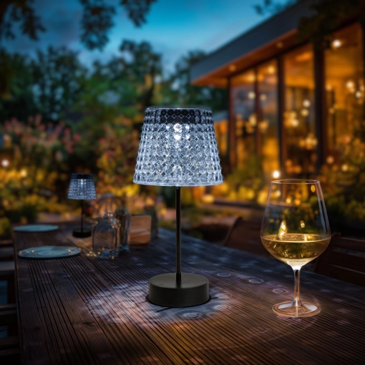 Lámpara de mesa solar dañada con pantalla transparente y LED blanco frío