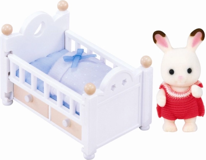 Conejito Chocolate en cuna: figura bebé con accesorios