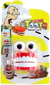 Dientes de broma de cuerda en tarjeta