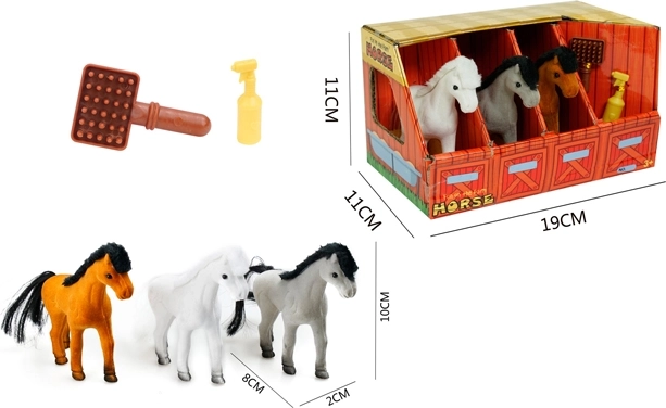 Tres ponis en el establo con accesorios