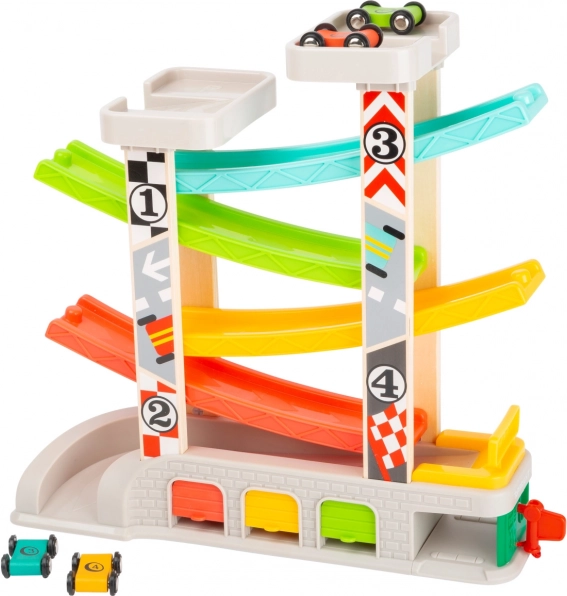 Pista de carreras con aparcamiento y garajes