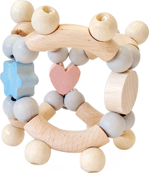Sonajero motriz de madera Hess en forma de corazón rosa-azul