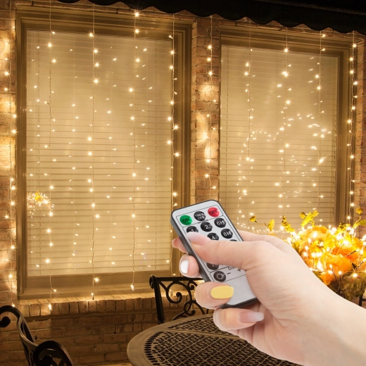 Cortina luminosa con 100 LED blancos cálidos y mando a distancia