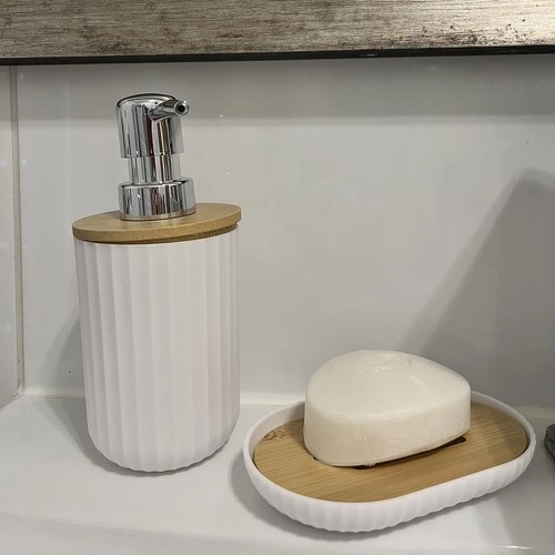 Dispensador elegante y funcional con jabonera